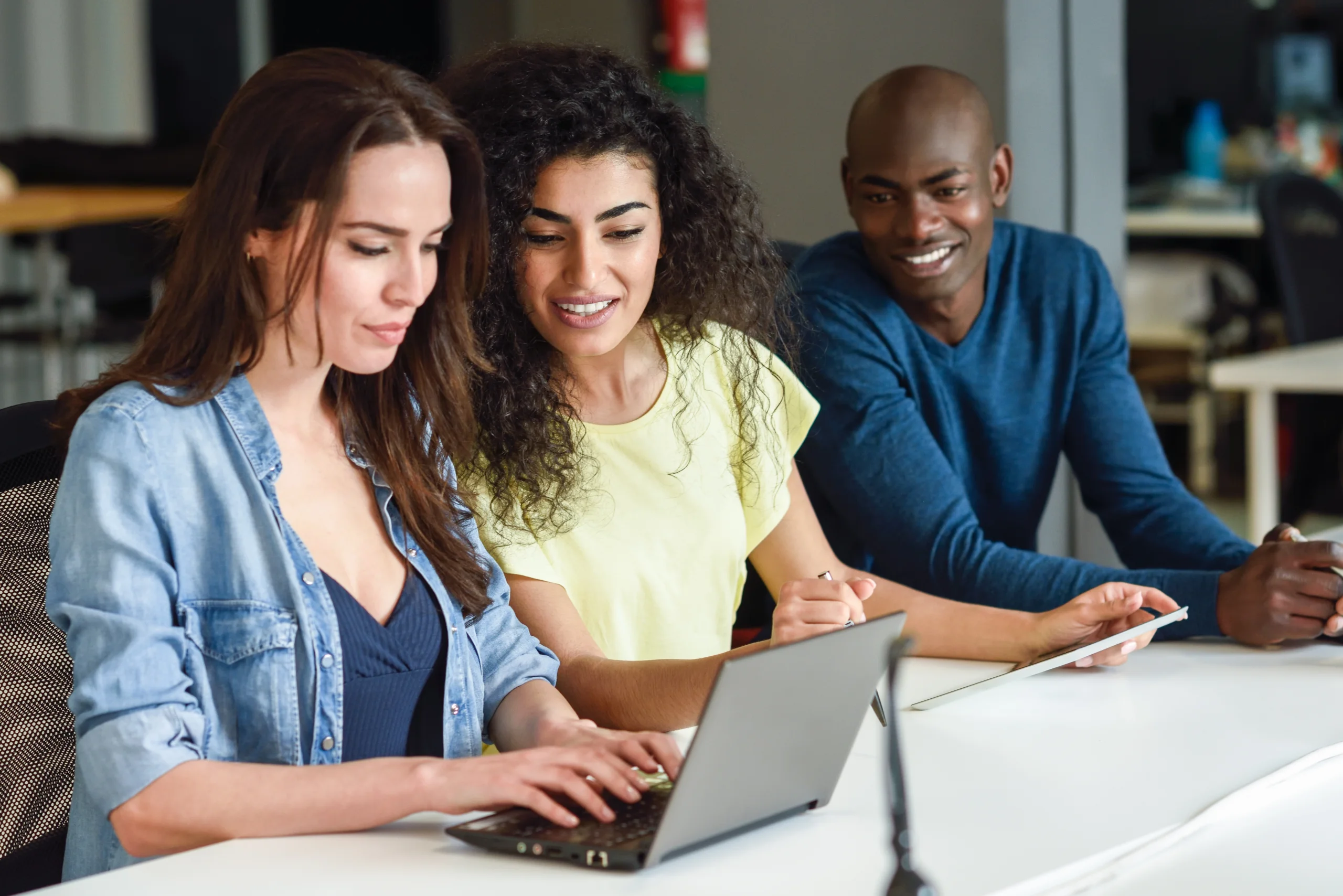 multi ethnic group young people studying with laptop computer scaled